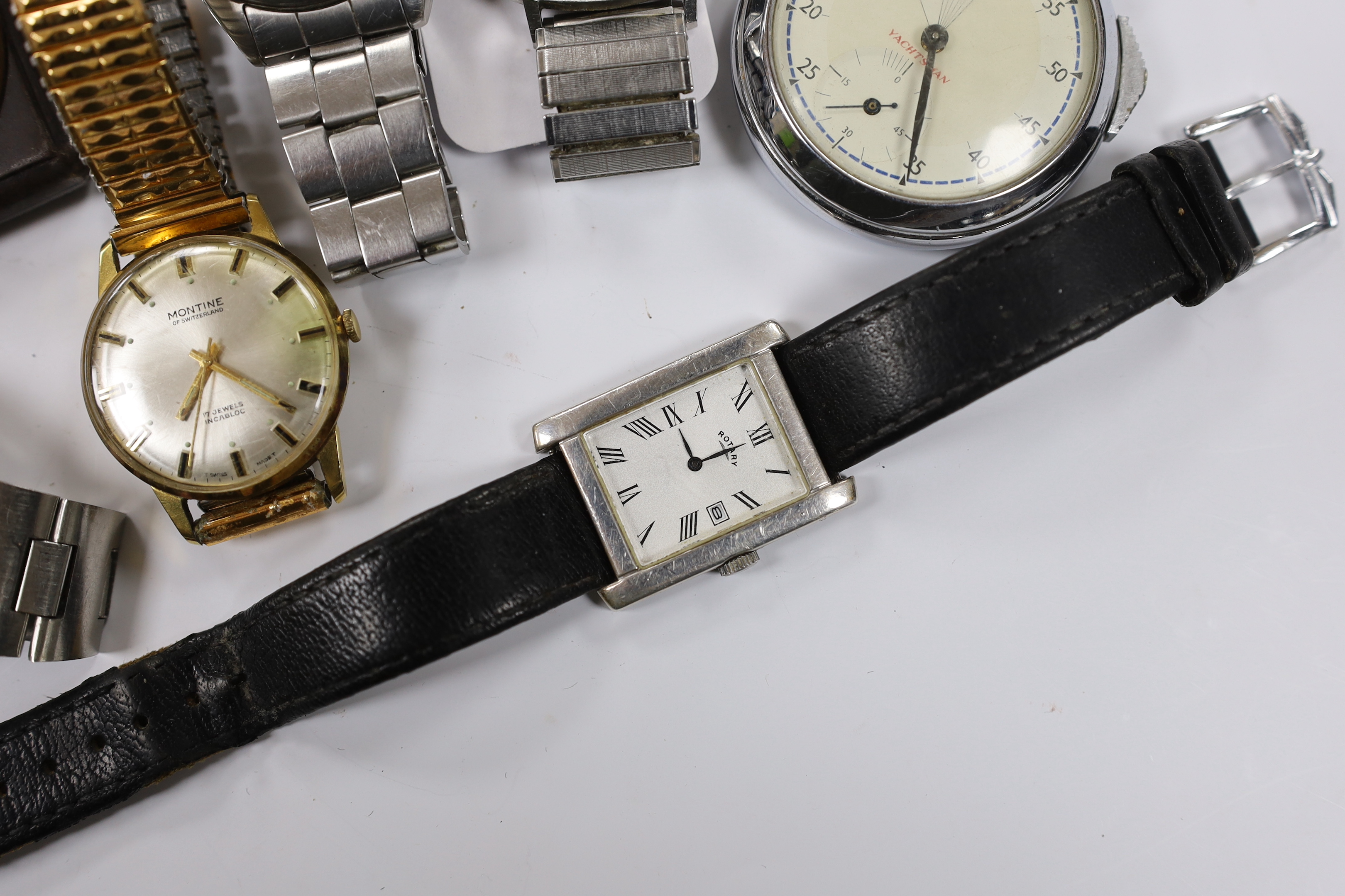 Six assorted gentleman's wrist watches including a Seiko Diashock automatic, two other Seiko watches and a sterling Rotary watch, together with a gun metal travelling timepiece and a 'Yachtsman' stop watch.